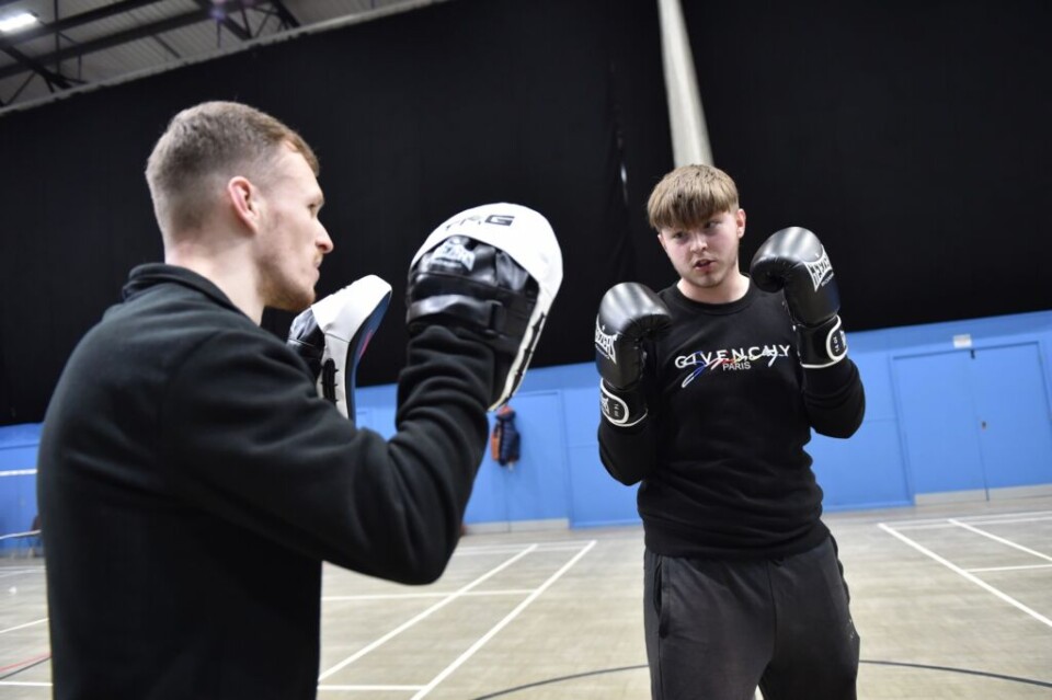 two boys boxing